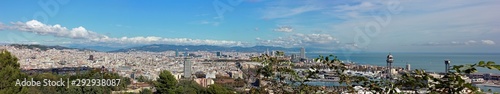 Panoramic view above city Barcelona from Saglada Familia to harbor