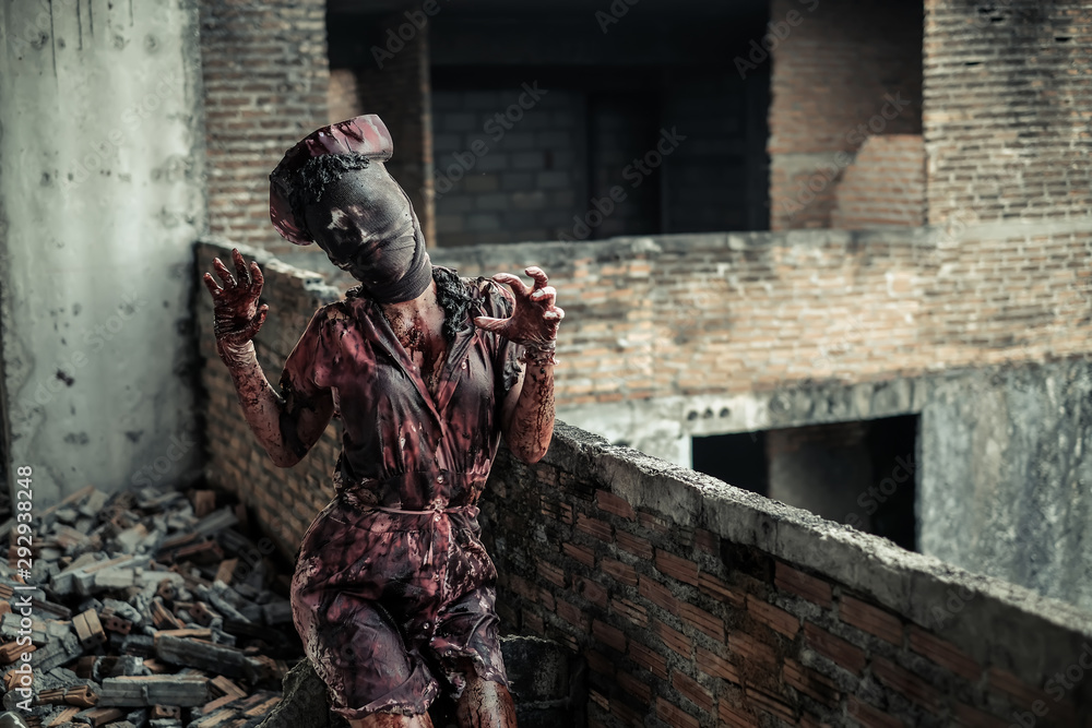 Fototapeta premium Ghost nurse woman or zombie in the building abandoned hospital.
