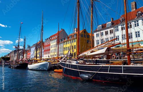 Beautiful cityscape with canal, ships and old buildings. Nyhavn in Copenhagen.