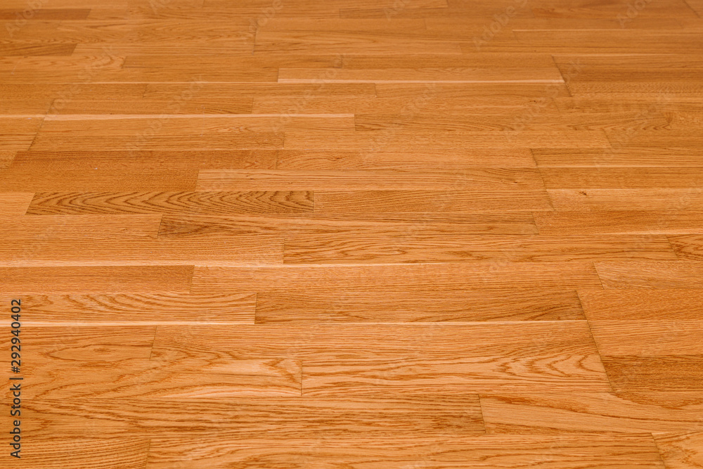 Top view of smooth seamless brown laminate floor texture background. natural wooden polished surface parquet texture. Wood pattern texture for design and decoration Top view of smooth seamless brown laminate floor texture background. natural wooden polished surface parquet texture. Wood pattern texture for design and decoration