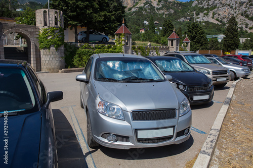 cars in the parking lot © Yuri Bizgaimer