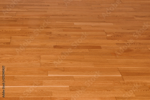 Top view of smooth seamless brown laminate floor texture background. natural wooden polished surface parquet texture. Wood pattern texture for design and decoration