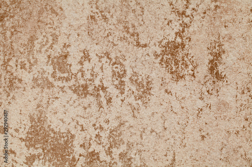 White and golden messy wall stucco texture background © mamfoto