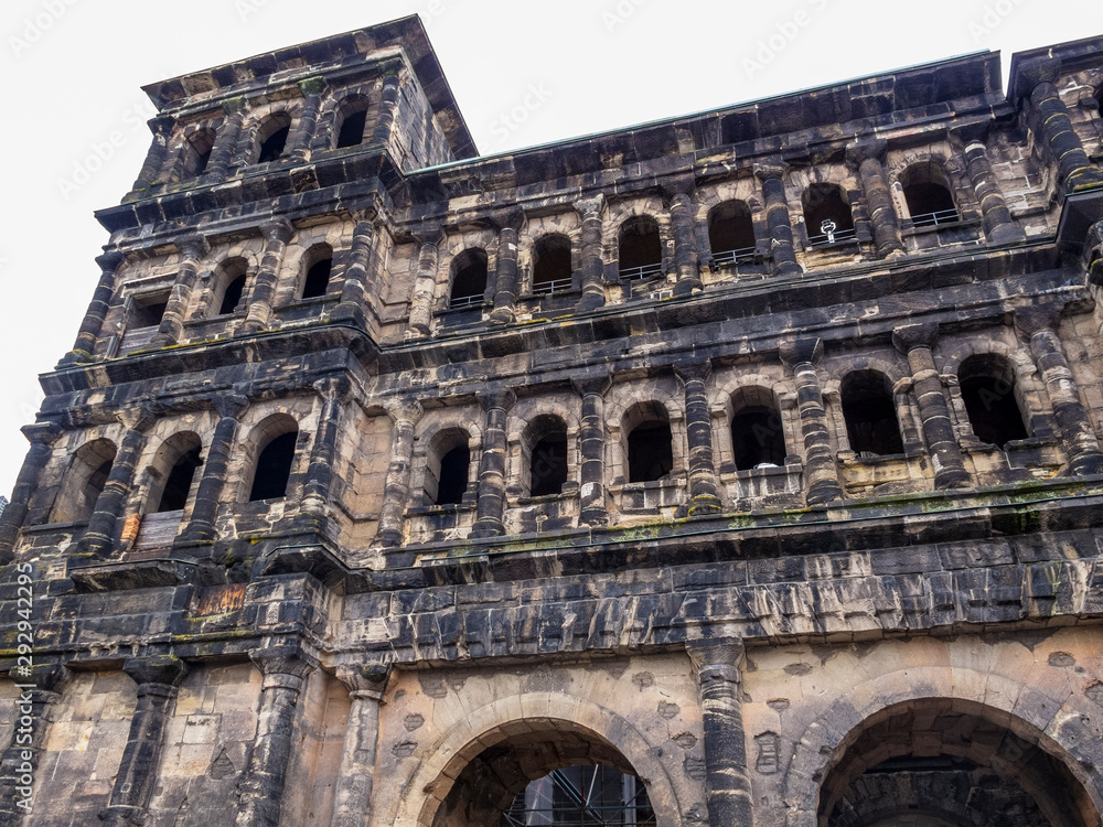 Porta Nigra, a Roman city gate in Trier, Germany, close low-angle partial view