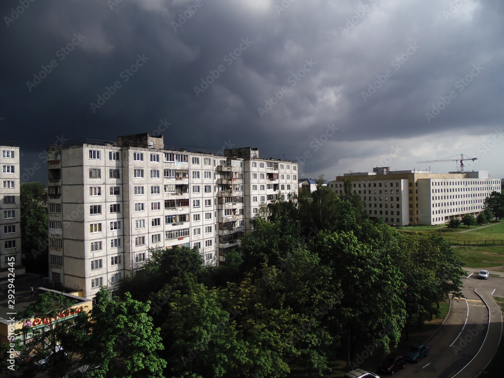 thunderous front is approaching residential areas of the city. thunderous front is approaching residential areas of the city.