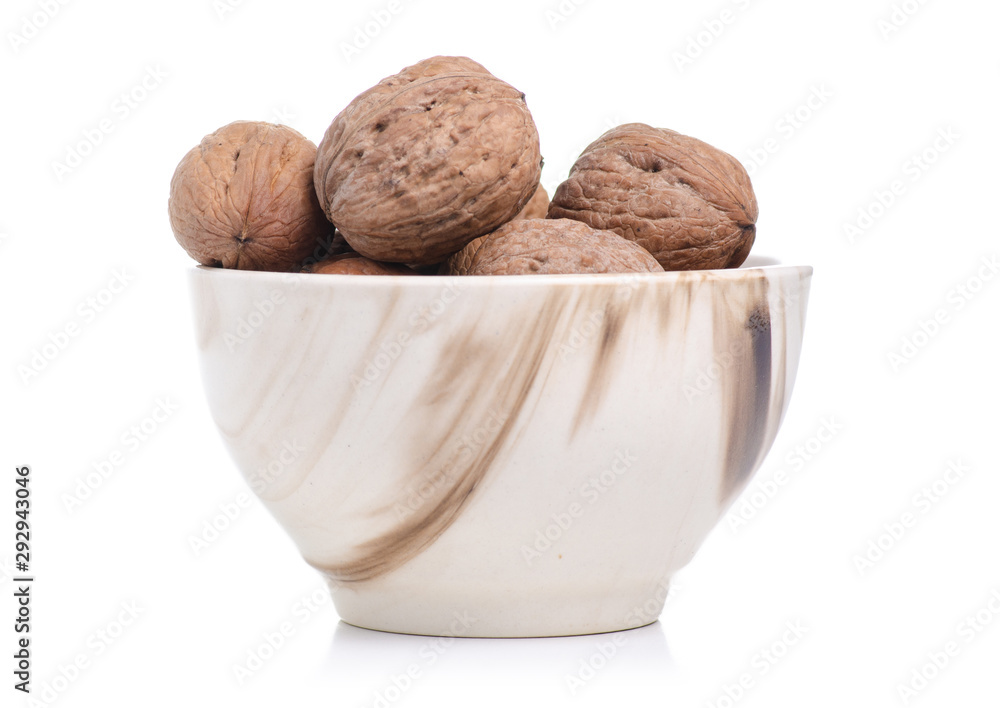 walnuts in bowl on white background isolation walnuts in bowl on white background isolation