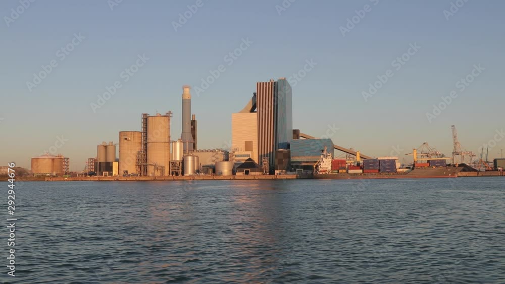 Power plant building in the Port of Rotterdam, viewed from the water Power plant building in the Port of Rotterdam, viewed from the water