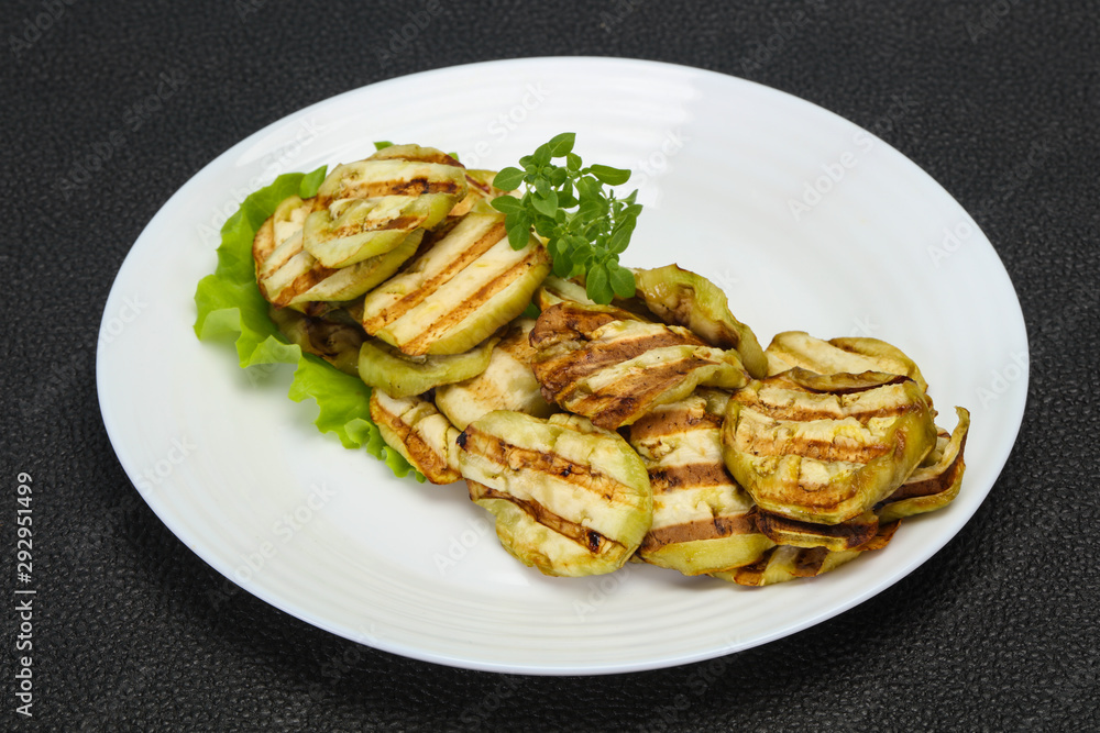 Grilled eggplant slices served basil Grilled eggplant slices served basil
