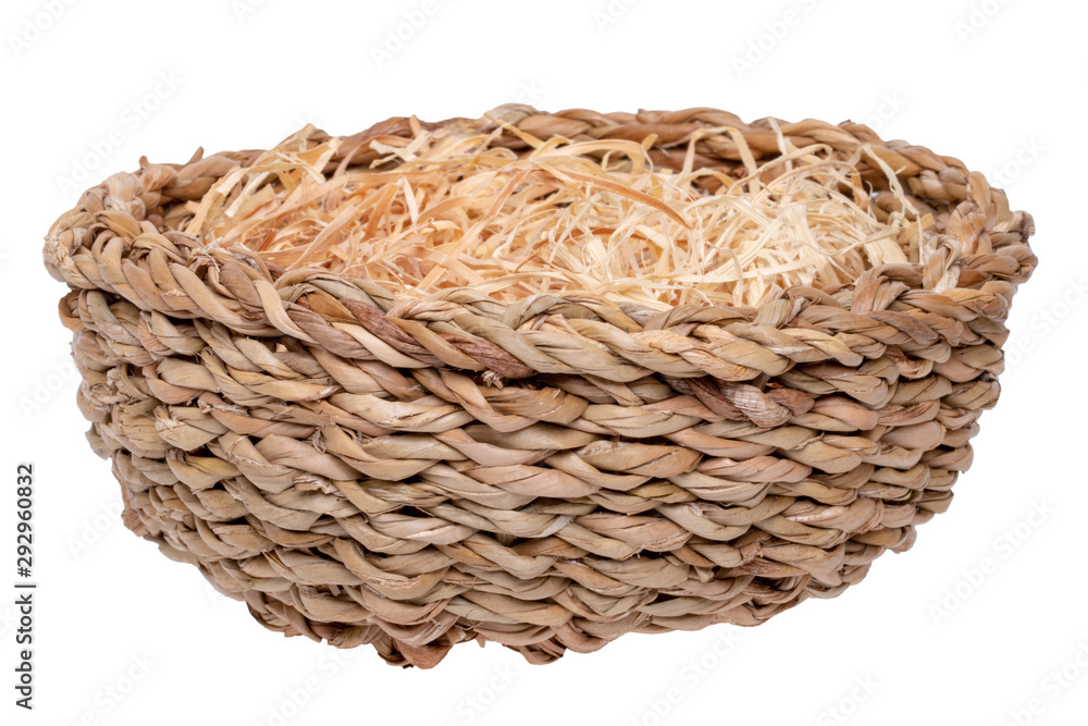 Empty basket. Close-up of a empty basket filled with decorative straw  isolated on a white background. For your food and product display montage.  Macro. Stock Photo | Adobe Stock