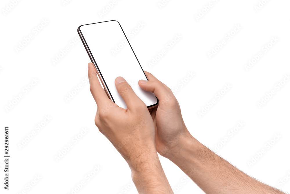 Man's hands texting on smartphone with blank screen Man's hands texting on smartphone with blank screen
