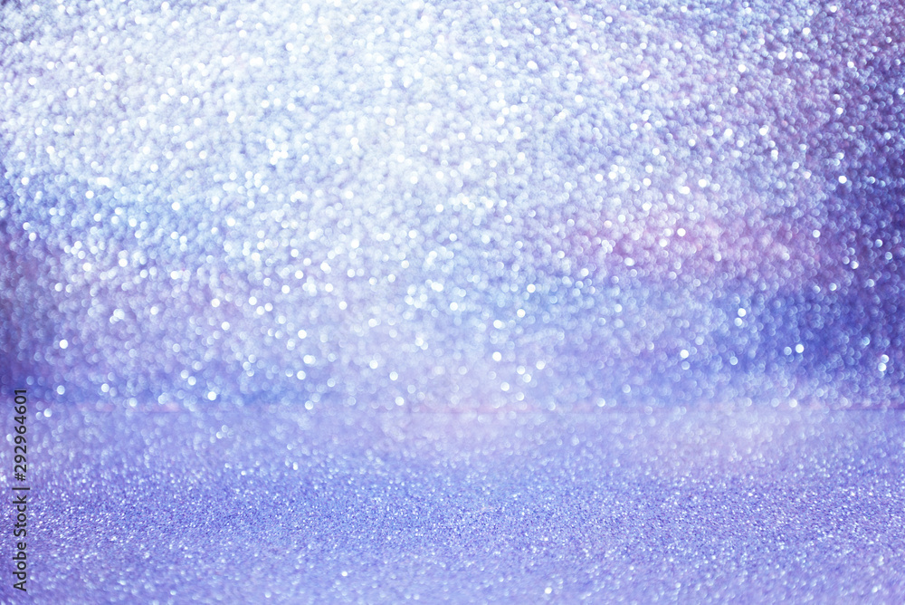 Obraz premium pastel purple glittering Christmas lights. Blurred abstract holiday background