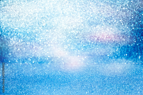 pastel blue glittering christmas lights. Blurred abstract holiday background