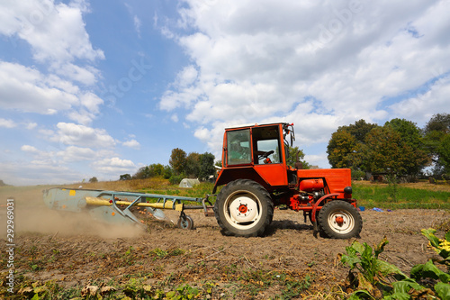 Ternopil region Ukraine  September 2019 Farmer with tractor with special equipment - digging potatoes. The concept of a good harvest.