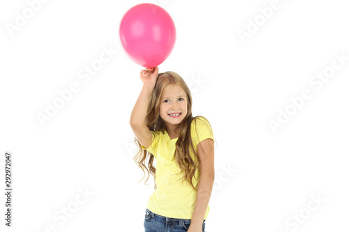 Pretty little girl with pink balloon on white background