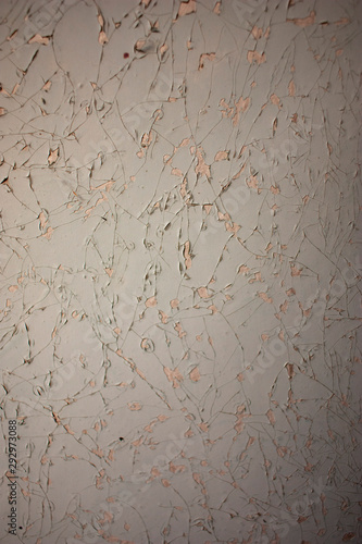 Fotografie Cracked white paint abstract background. Large plan.