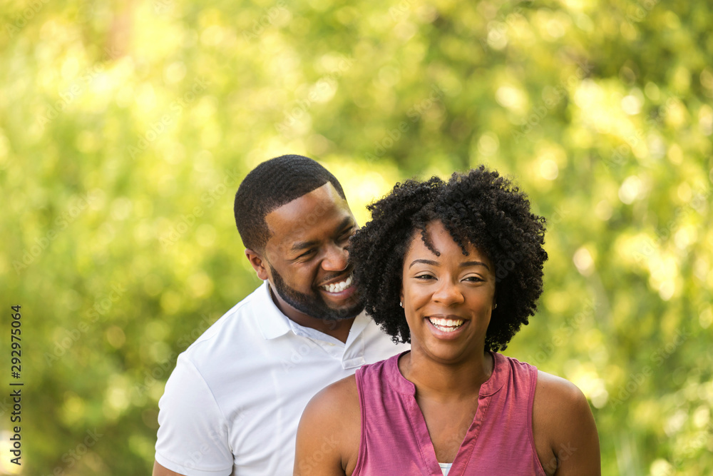 Happy African American couple laughing and smiling. Happy African American couple laughing and smiling.