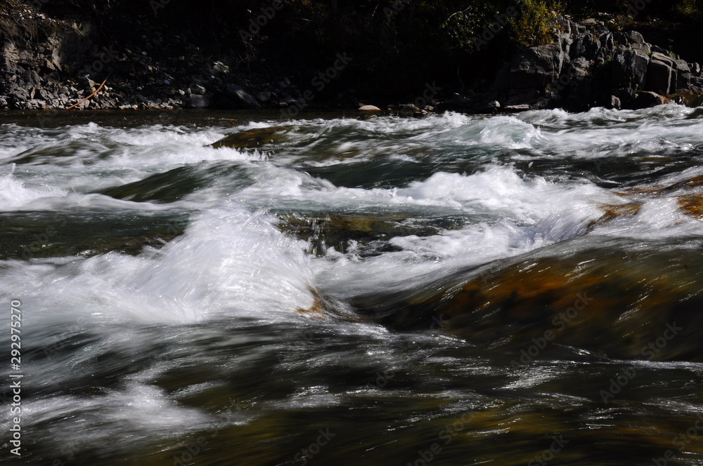 water flowing over rocks water flowing over rocks