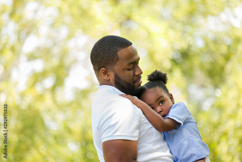 African American father parenting and talking with his daughter. African American father parenting and talking with his daughter.
