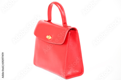 Red women's handbag isolated on white background - Image photo