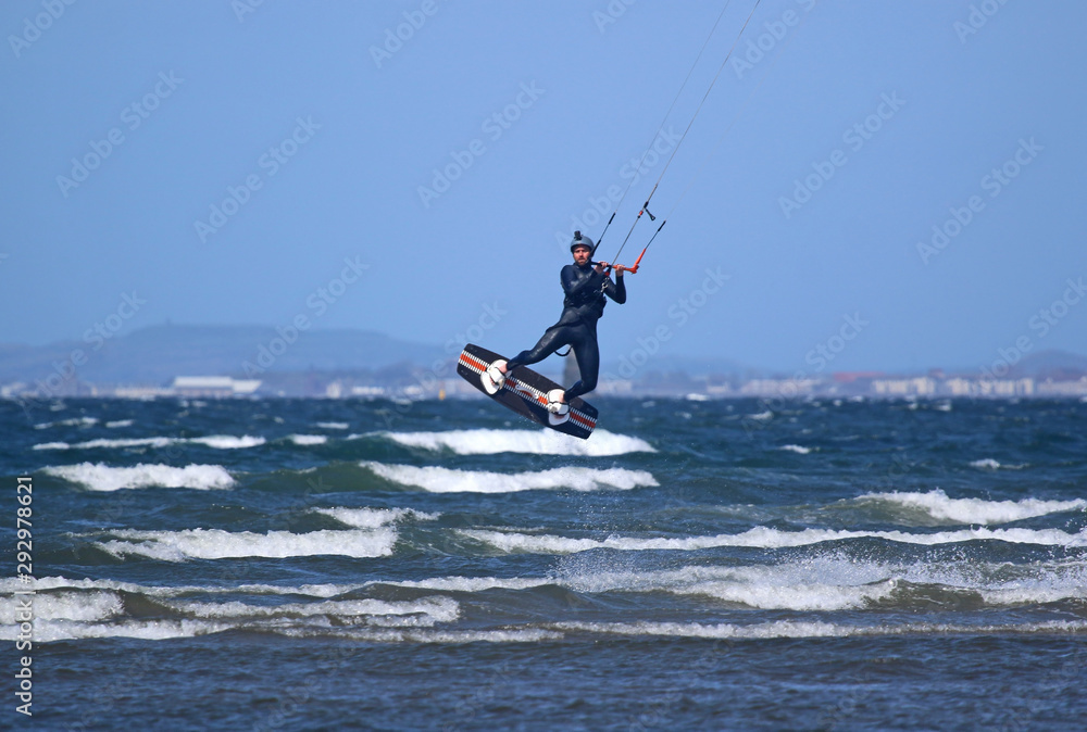 Kitesurfer riding off Barassie Beach, Troon