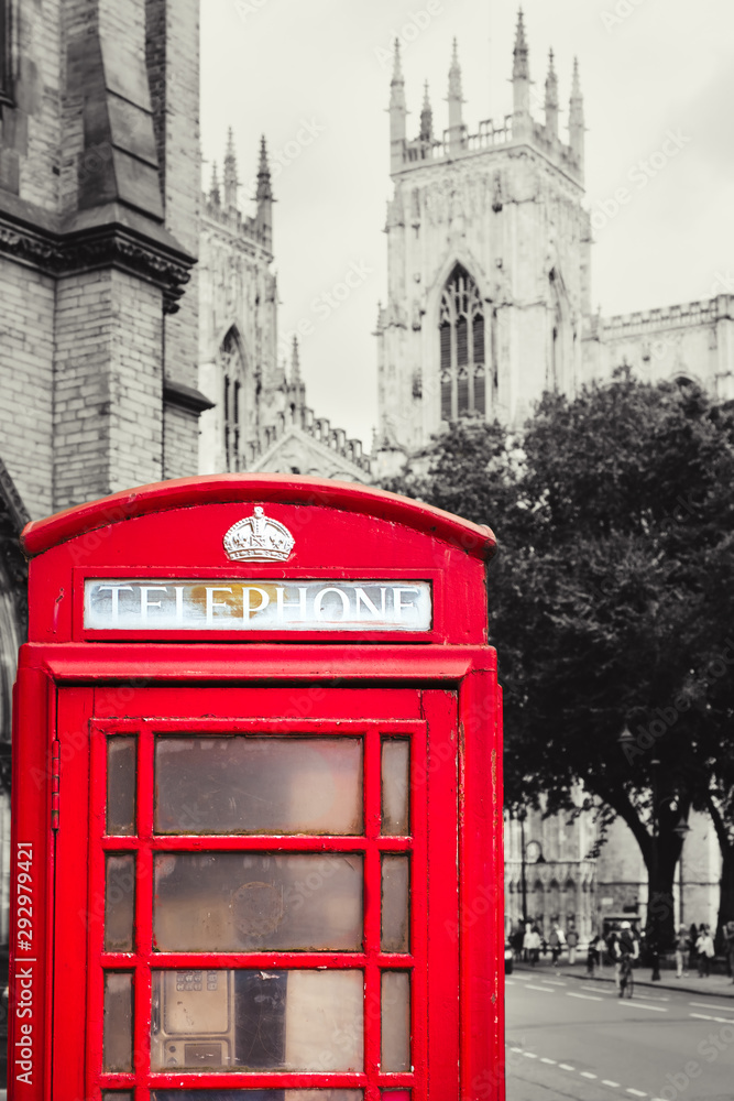 Old british red phone booth with the York Cathedral on the background - Background in black and white Old british red phone booth with the York Cathedral on the background - Background in black and white