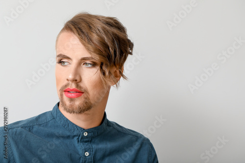 Portrait of young transgend...