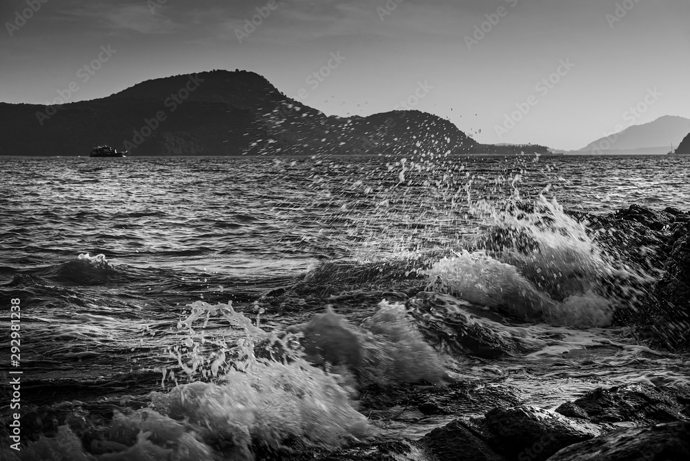 Sea sunset or sunrise with water splash, Black and white and monochrome style