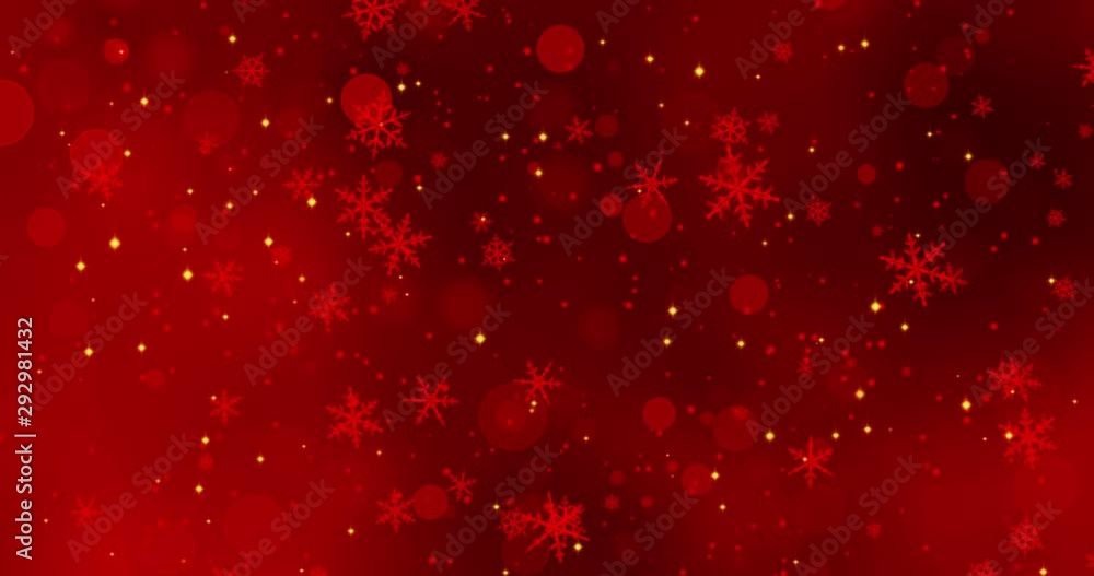 Red confetti, snowflakes and bokeh lights on the red Christmas background.