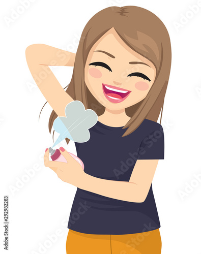 Teenager woman spraying her armpit using cologne