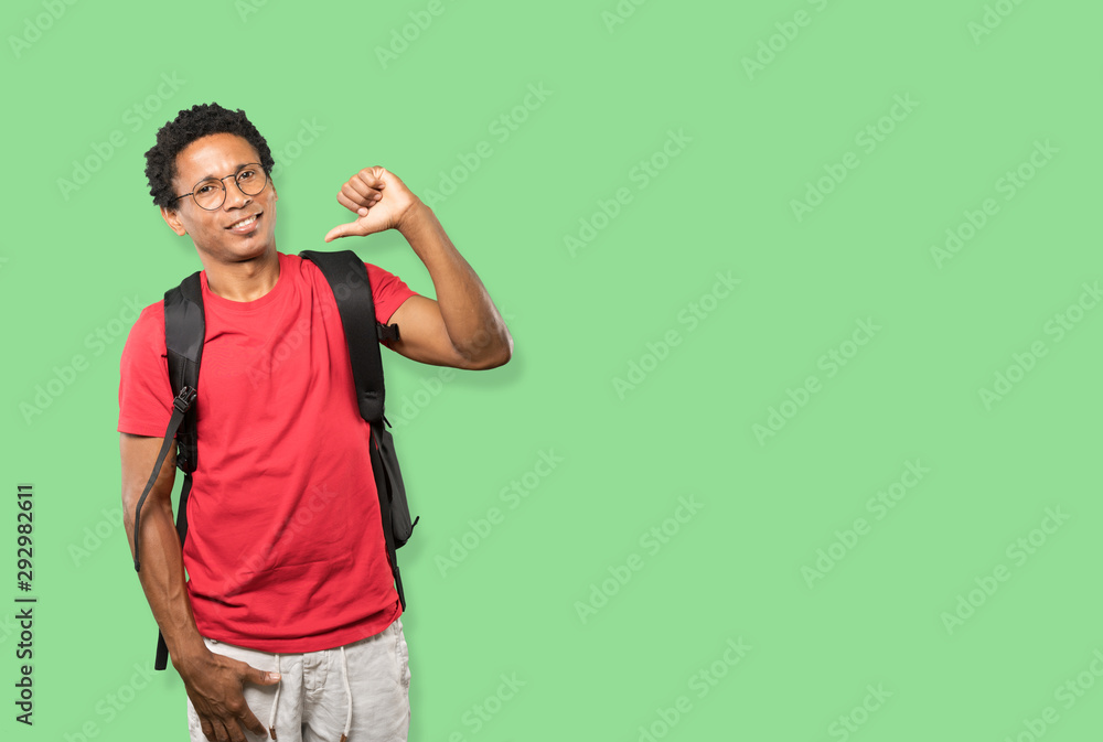 Proud young man making a haughty gesture Proud young man making a haughty gesture