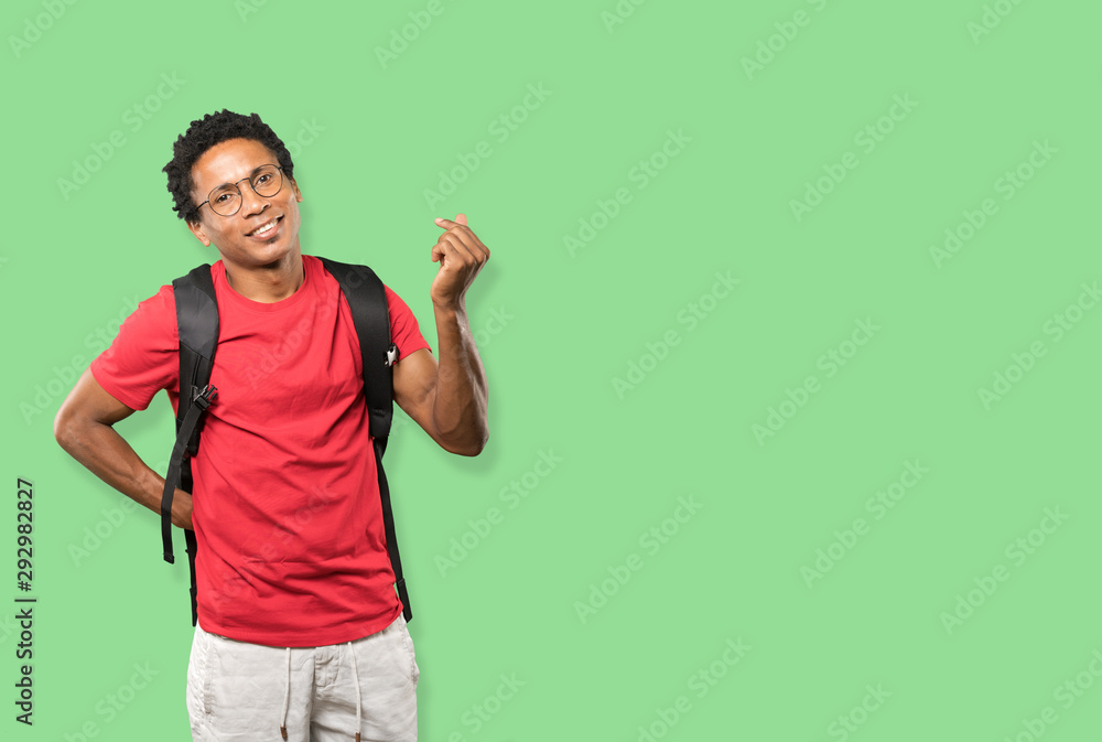 Young man making a gesture of worried about his economy Young man making a gesture of worried about his economy