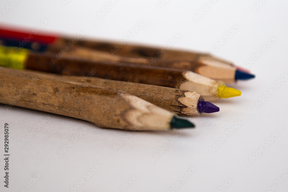 Obraz premium Colored pencils for children. Natural wood material on a white background. Pencils for drawing.