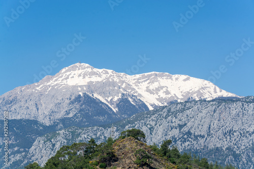 The snowy top of the mountain. Photo taken in the area of Tekirova, Antalya Turkey