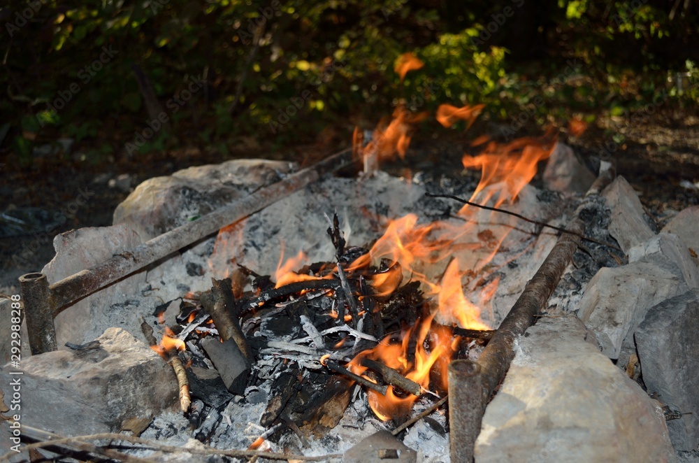 Bonfire, coal and stones in the forest. Bonfire, coal and stones in the forest.