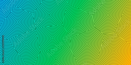Abstract background of concentric circles in green and yellow colors