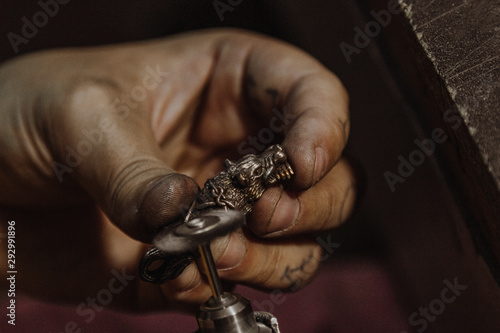 Jeweler working at workshop