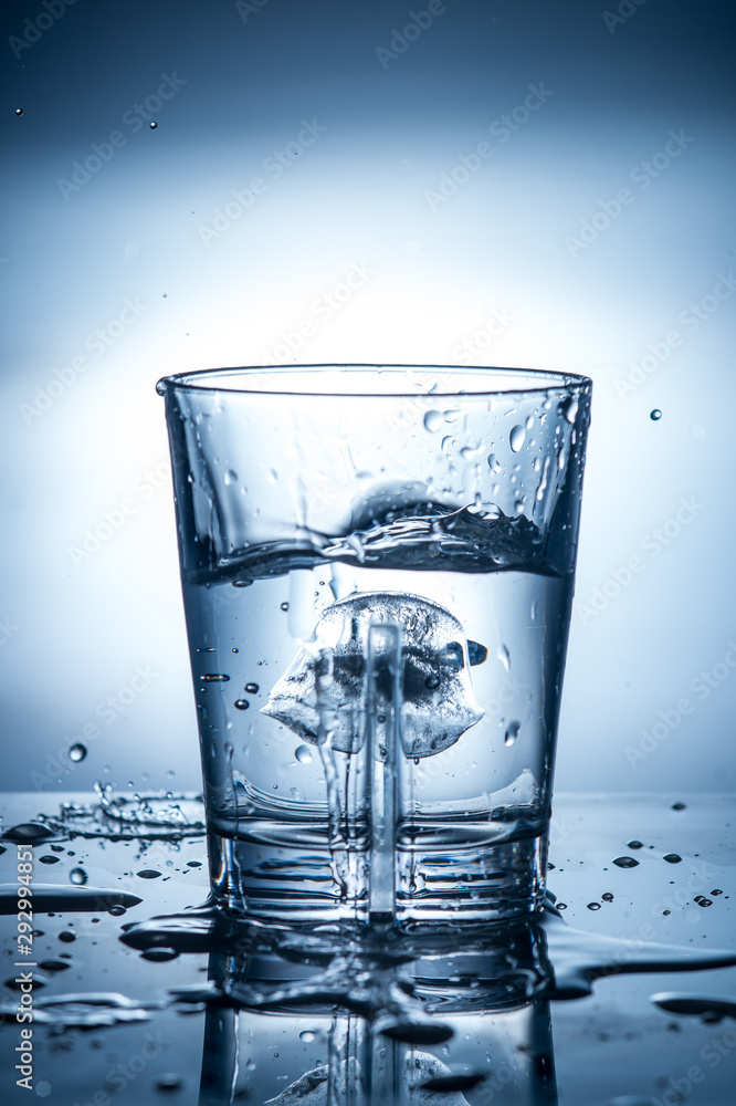 splashing clean water in a glass splashing clean water in a glass