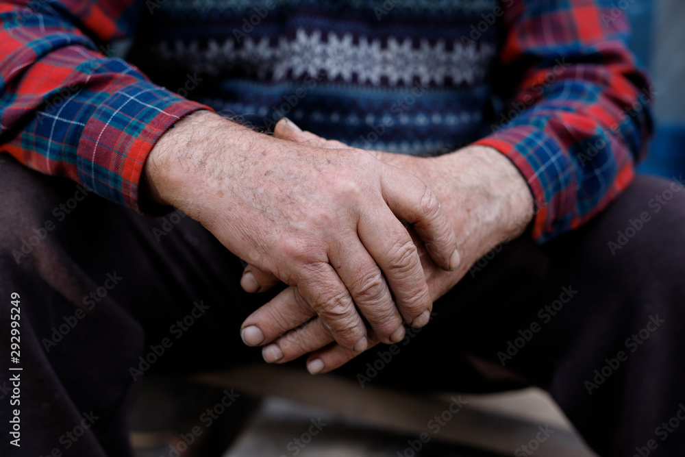 Pair of old hands clasped together. Aging process. Wrinkled hands of old man. Pair of old hands clasped together. Aging process. Wrinkled hands of old man.
