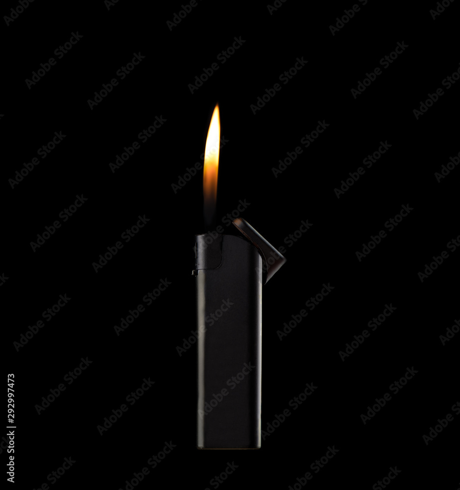 Orange flame from a gas lighter. Close up. Orange flame from a gas lighter. Close up.