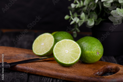 lime juice with lime slices on wooden table. Detox diet © dmytro_khlystun