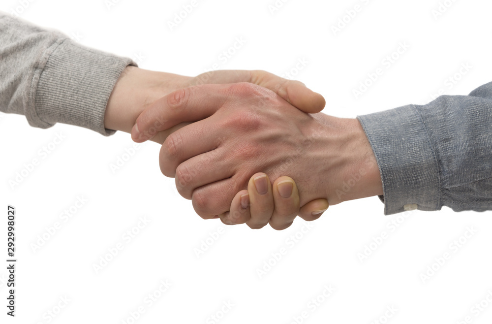 A firm handshake between two partners on isolated white background. Image. A firm handshake between two partners on isolated white background. Image.