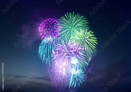 Bright and vividly coloured fireworks display celebrations background. photo