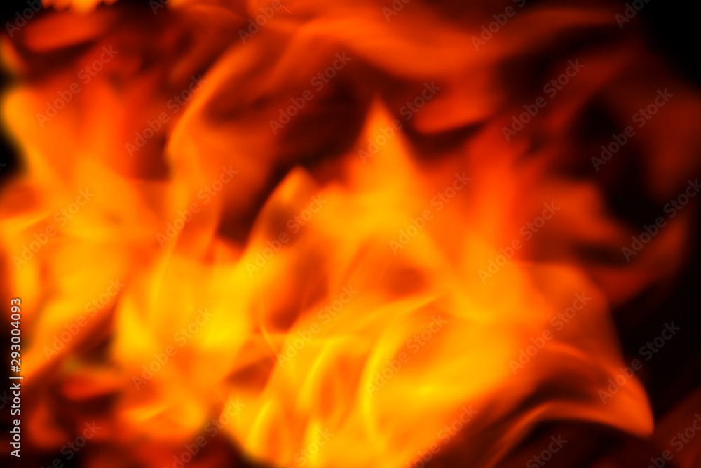 Orange fire background. fire on a black background. Orange fire background. fire on a black background.