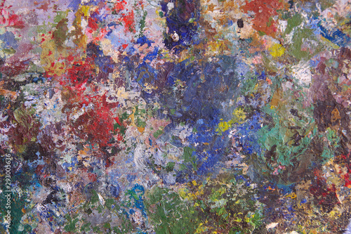 Abstract colorful background made with oil paint.