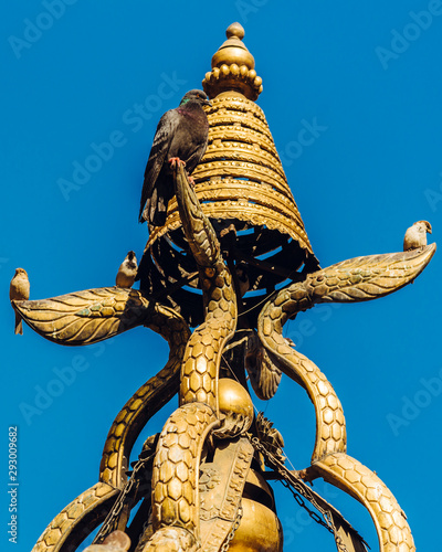 The golden temple in Patan, unique Buddhist monastery in north of Durbar Square, Kathmandu of Nepal. photo