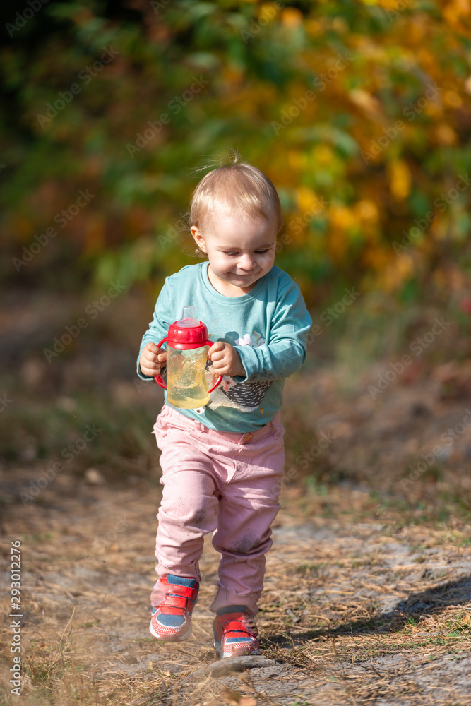 Adorable girl having fun on beautiful autumn day Adorable girl having fun on beautiful autumn day