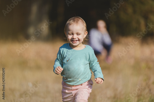Adorable girl having fun on beautiful autumn day © Andrzej Wilusz