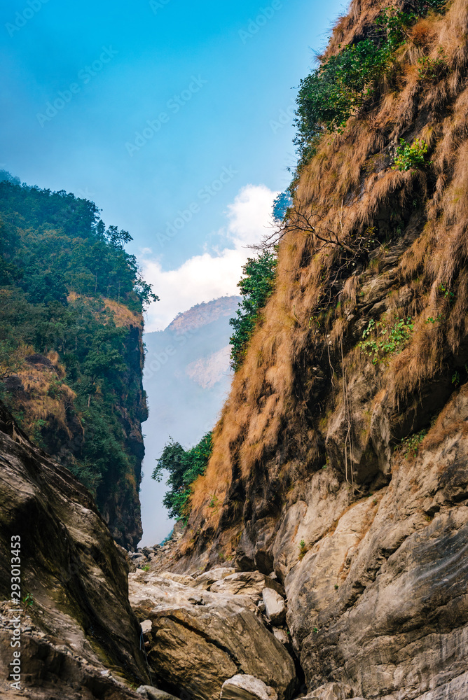 Waterfall Rocky valley in Himalaya mountains in Nepal.