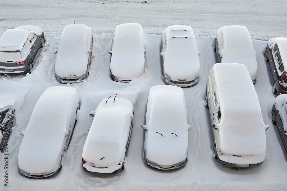Winter parking cars covered with snow Winter parking cars covered with snow