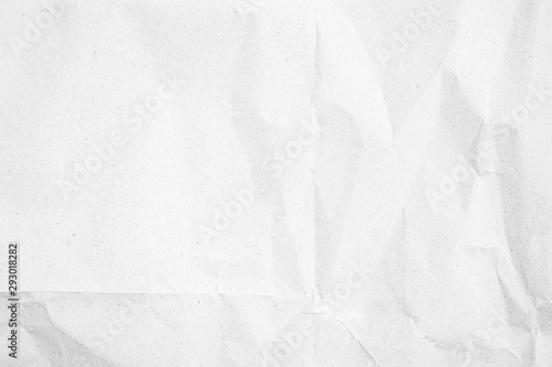 White recycled craft paper texture as background. Grey paper texture, Old vintage page or grunge vignette. Pattern rough art creased grunge letter. Hardboard with copy space for text.